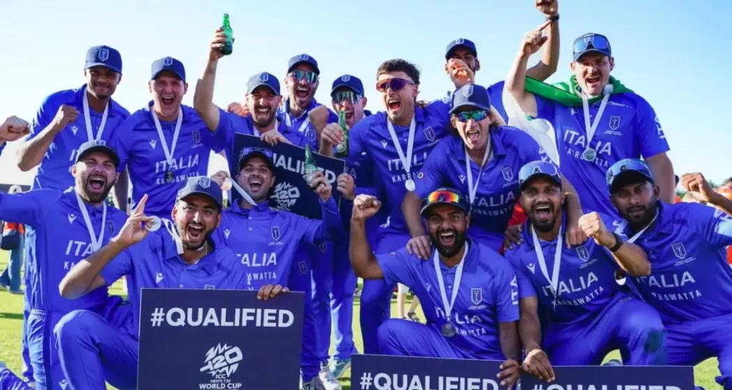 Italian cricket players cheering after winning their qualifying match