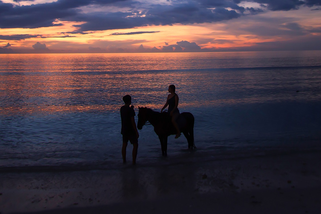Horseback riding along Seminyak Beach