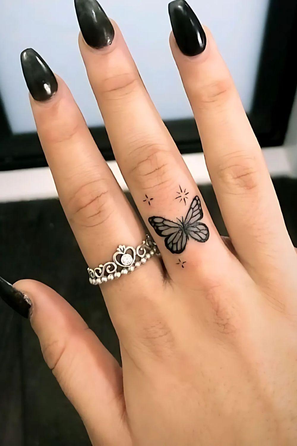 Butterfly Finger Tattoo