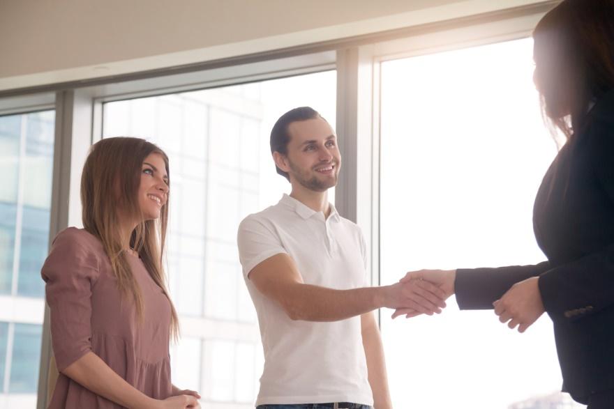 A couple consulting a tax professional regarding their tax debt


