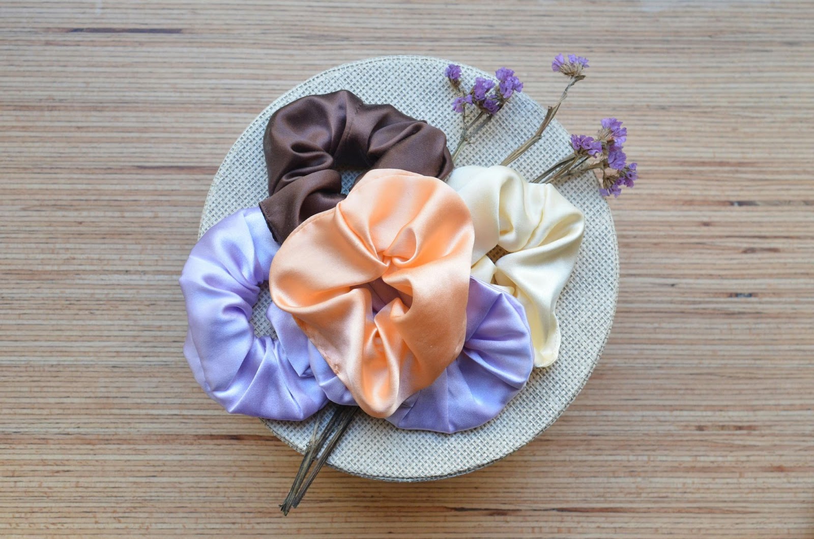 A multicolored hair bands with blossoming flowers in sunlight