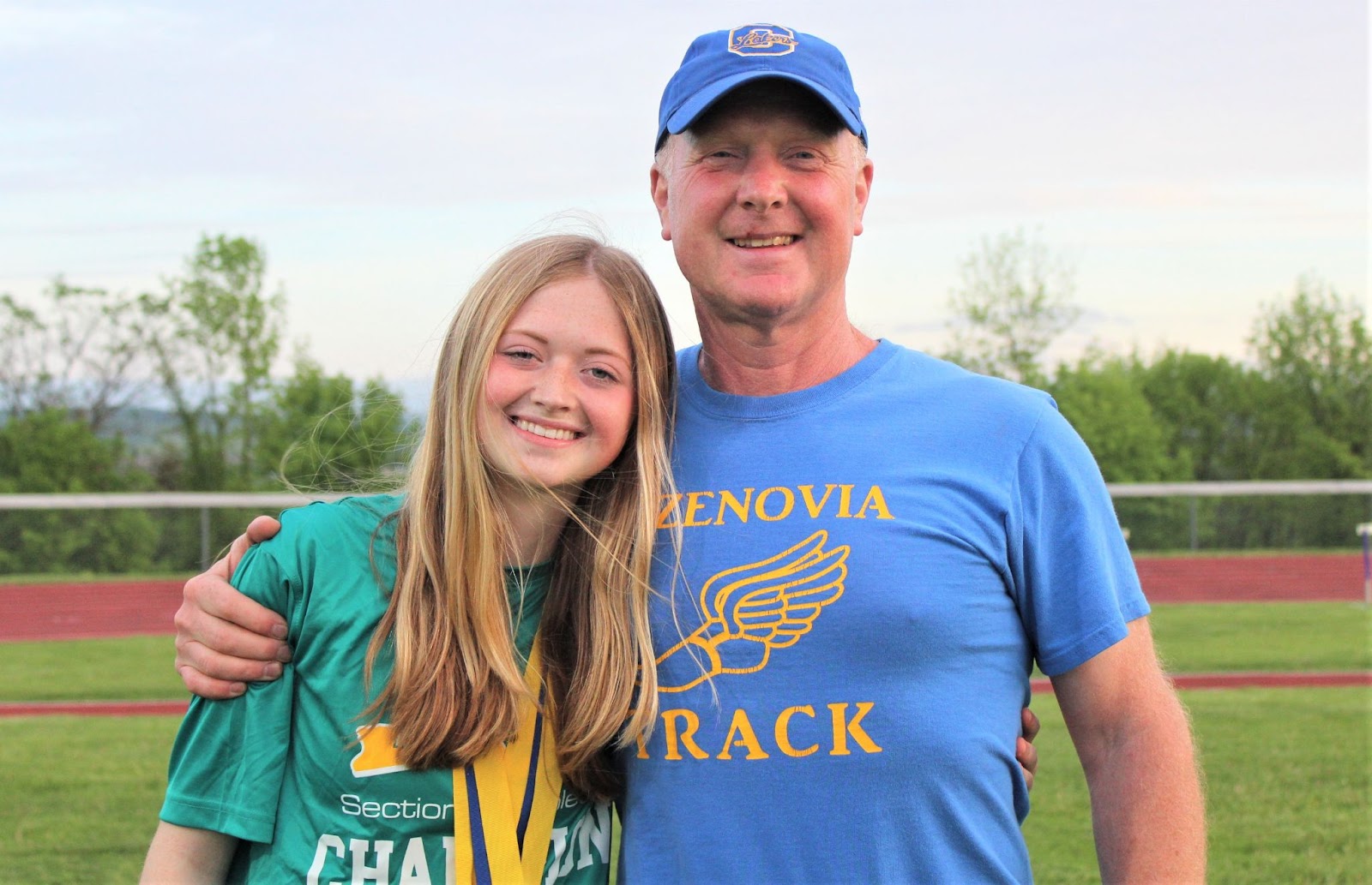  Wheeler with his daughter Faith after winning the 2022 Section III championship.