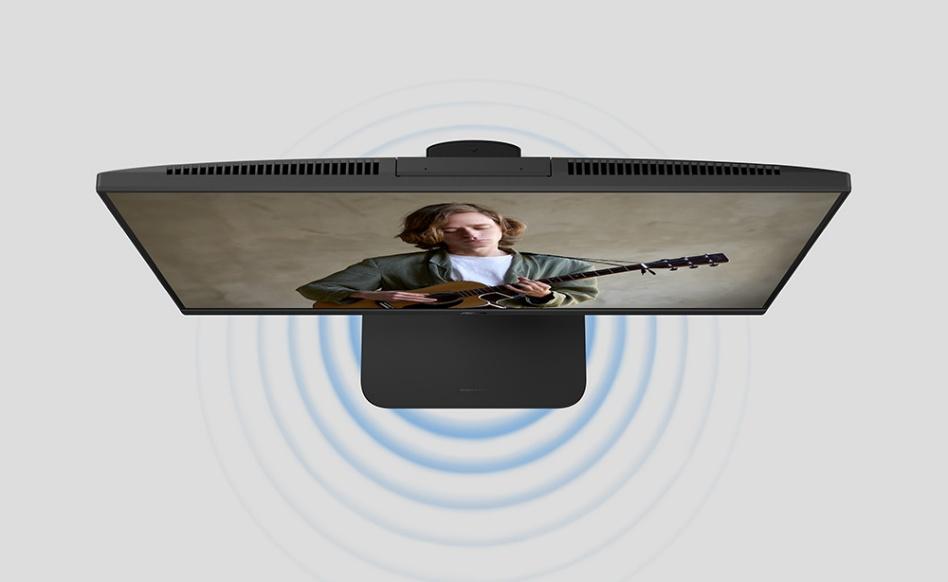 A computer monitor with a person playing guitar

AI-generated content may be incorrect.