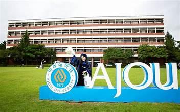 A person standing in front of a large sign

AI-generated content may be incorrect.