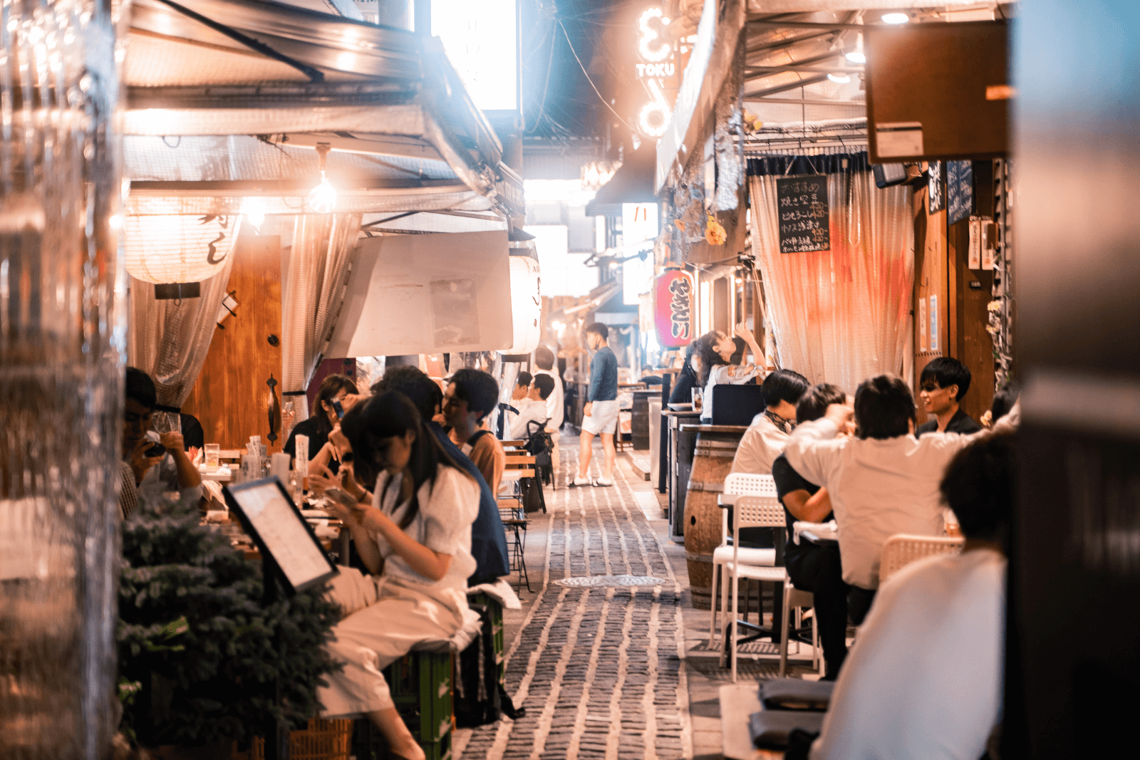 Outdoor restaurant with people dining