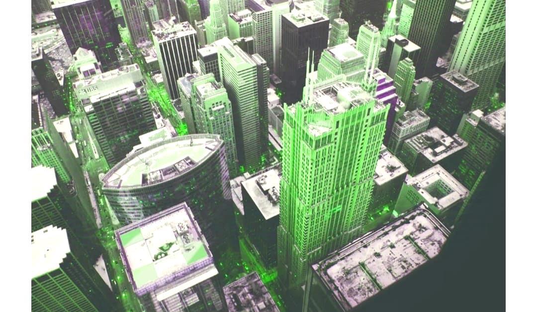 Aerial view of a city with green lights

AI-generated content may be incorrect.