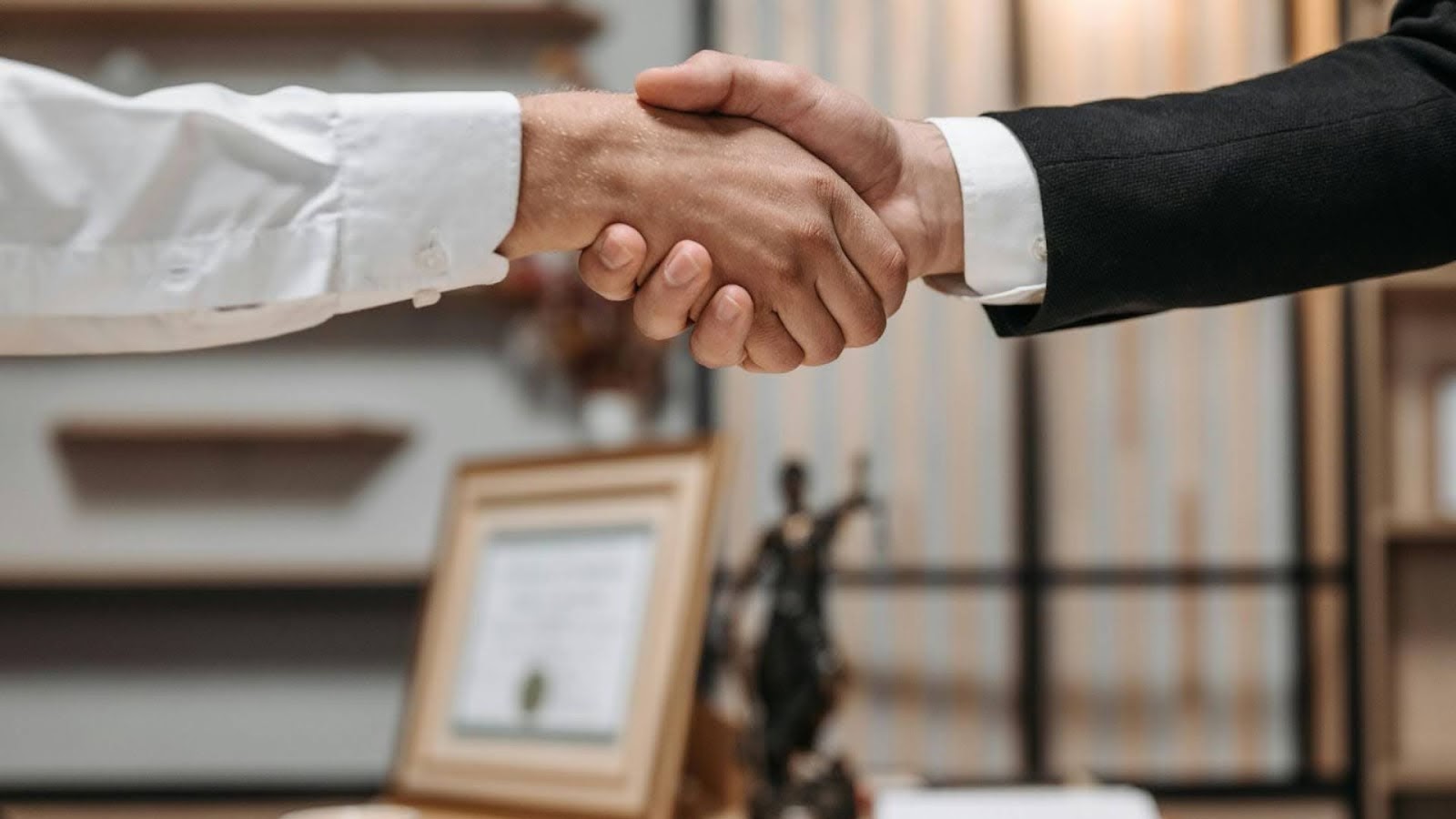 two people shaking hands