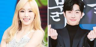 This contains an image of Actor Kang Hoon and Taeyeon