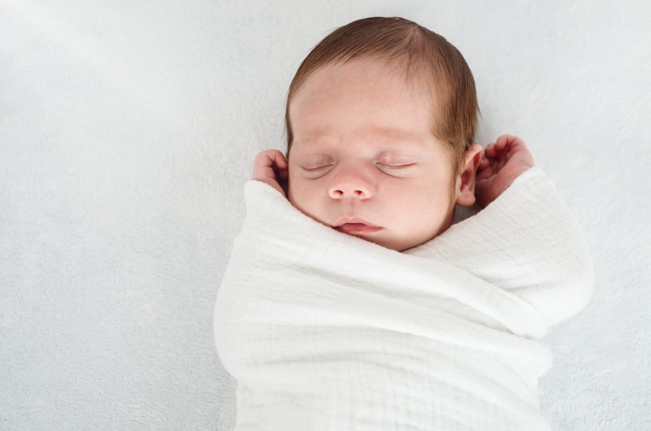 Baby swaddled // Healthier Baby Today