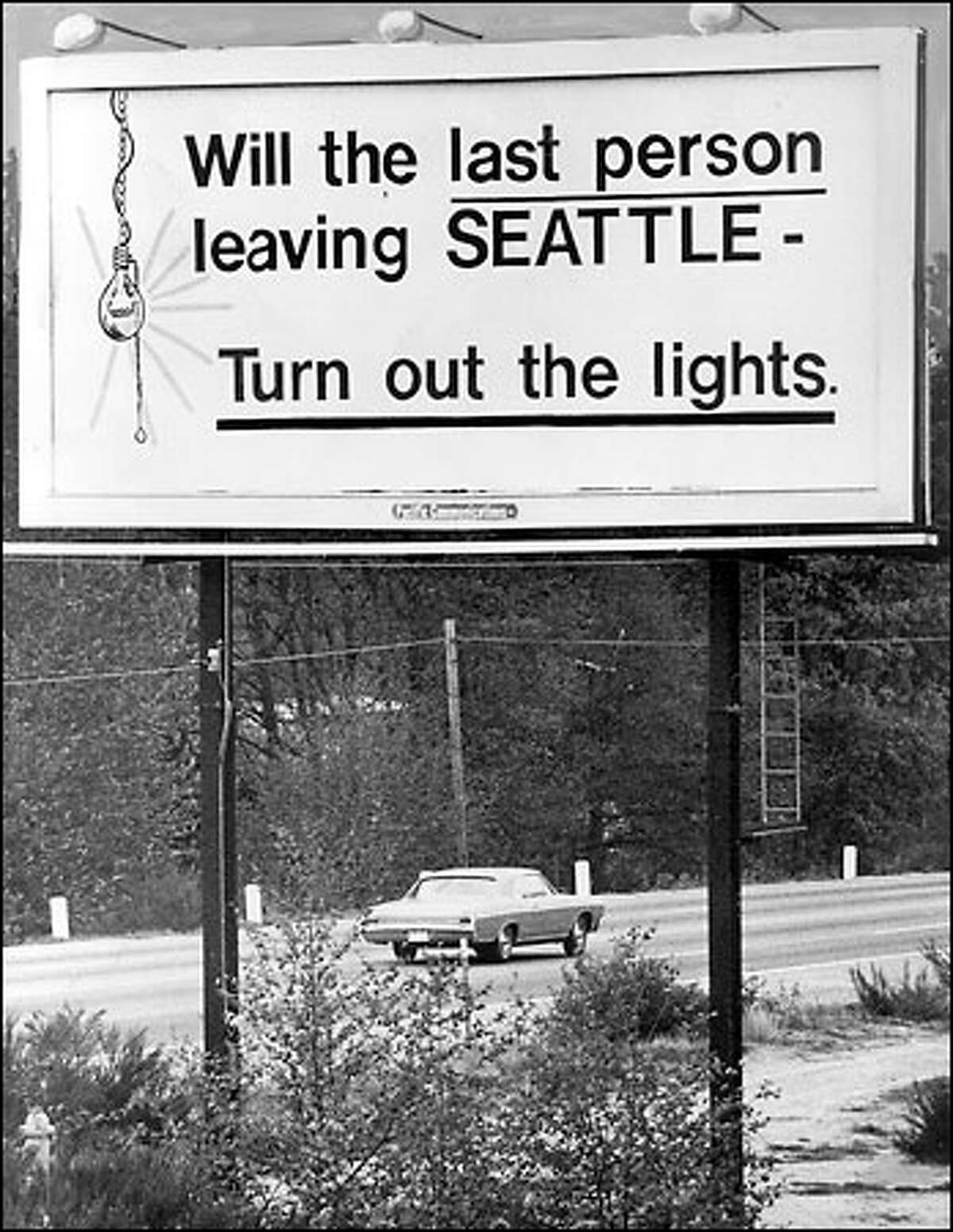 A sign from 1971 during the Boeing Bust that says "Will the Last Person Leaving Seattle Turn Out the Lights"
