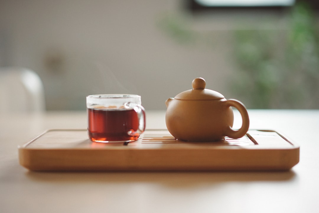 A cup of herbal tea on a wooden table