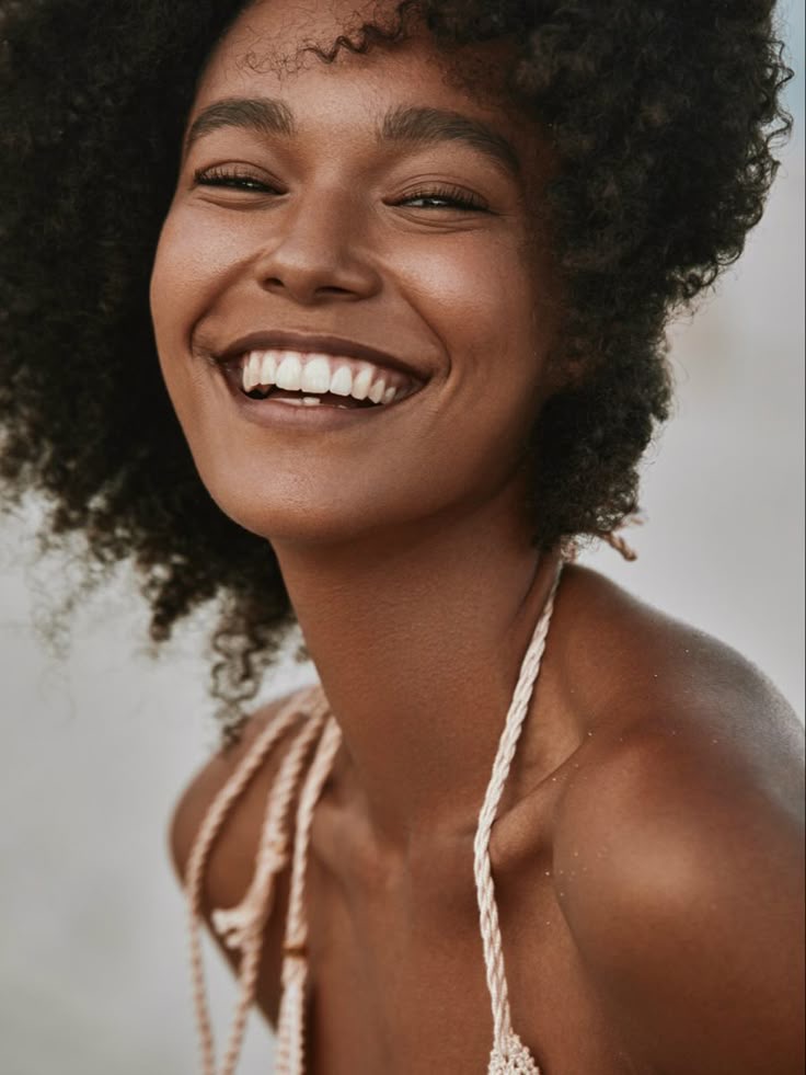 Alt Image: Black woman smiling. Image sourced from Pinterest (original creator unknown). If this is your work, please contact us for proper credit.