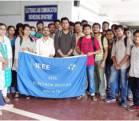 A group of people holding a banner

AI-generated content may be incorrect.