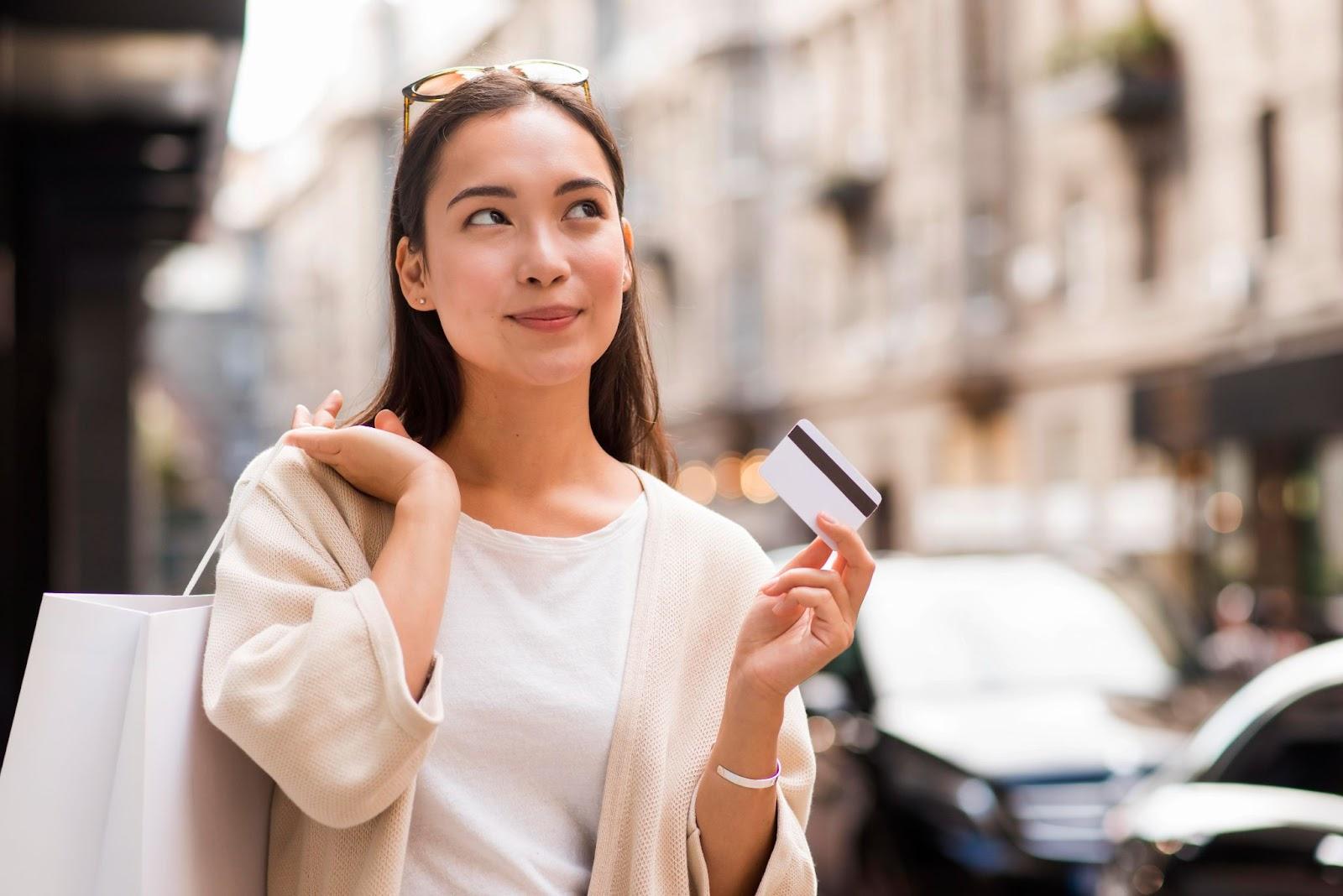 A person holding a card

AI-generated content may be incorrect.