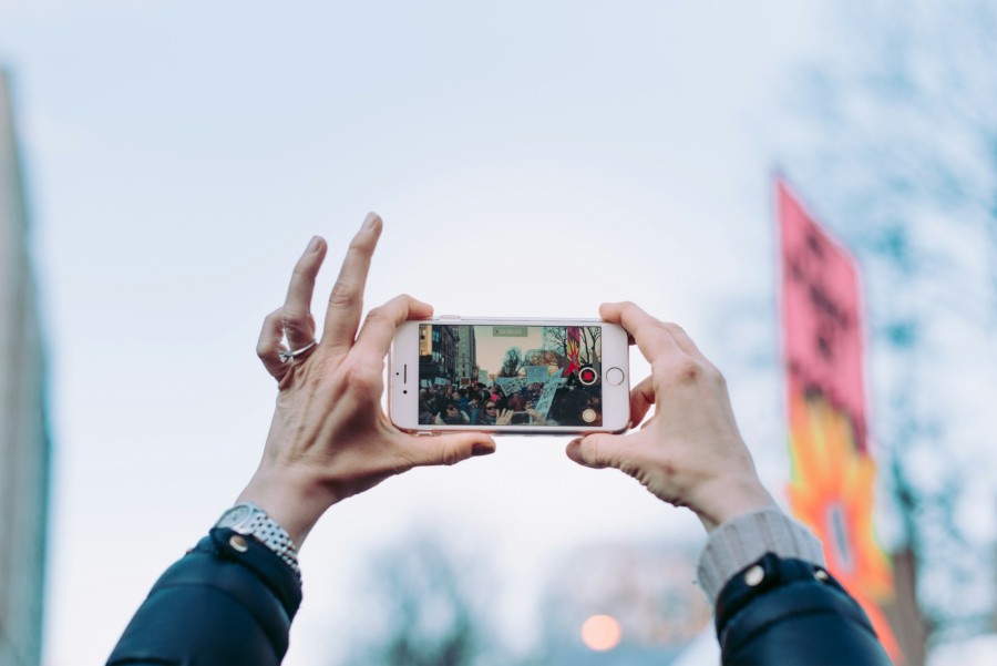 person taking photo during daytime