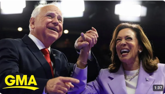 https://nhandinhthoicuoc.com/wp-content/uploads/2024/08/KAMALA-AND-TIM-WALZ-550x314.png