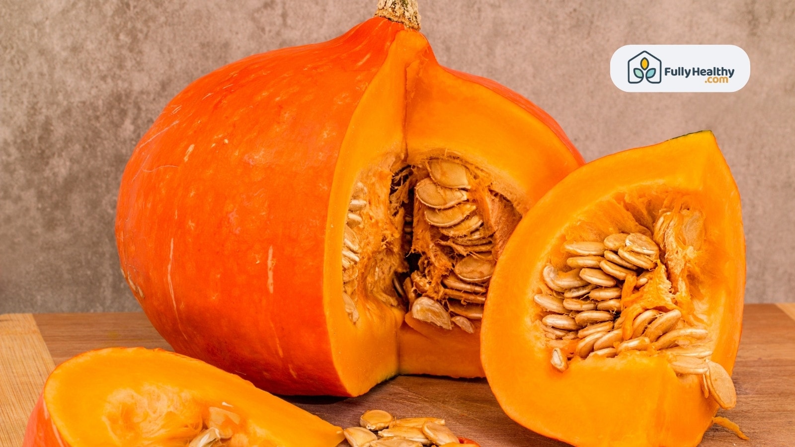 Sliced pumpkin showing seeds and vibrant orange interior flesh