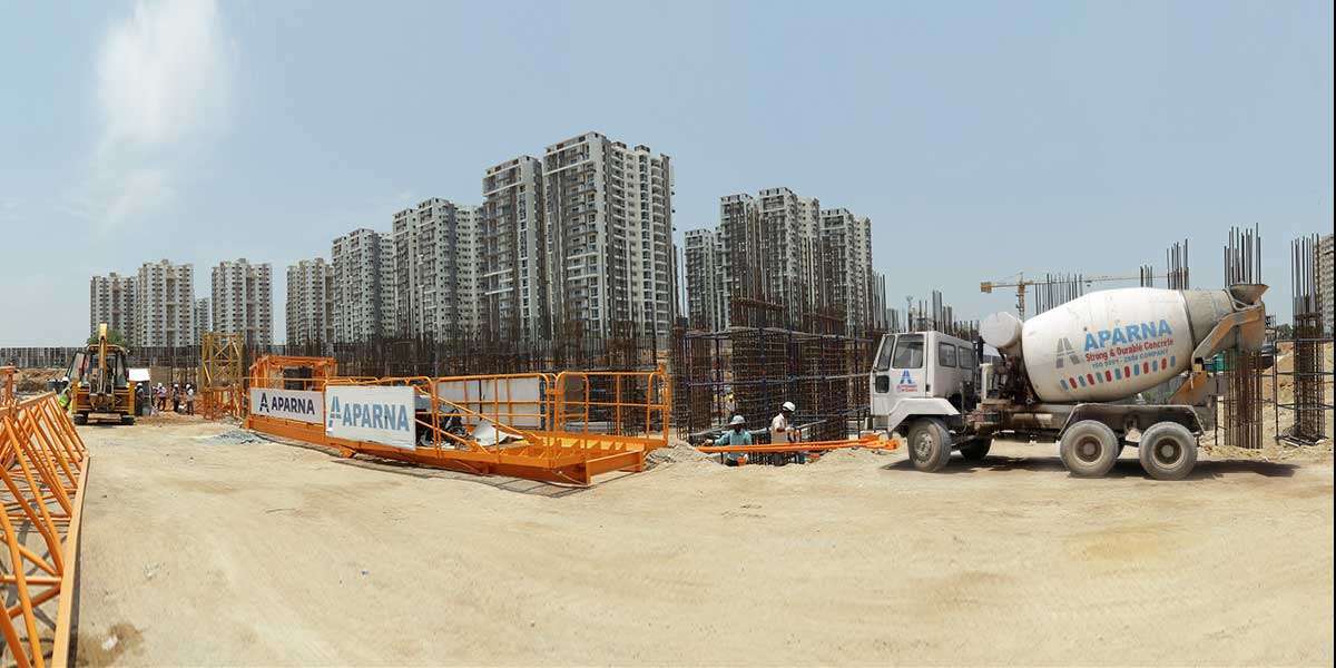 Aparna RMC transit mixers delivering concrete for Hyderabad infrastructure projects.