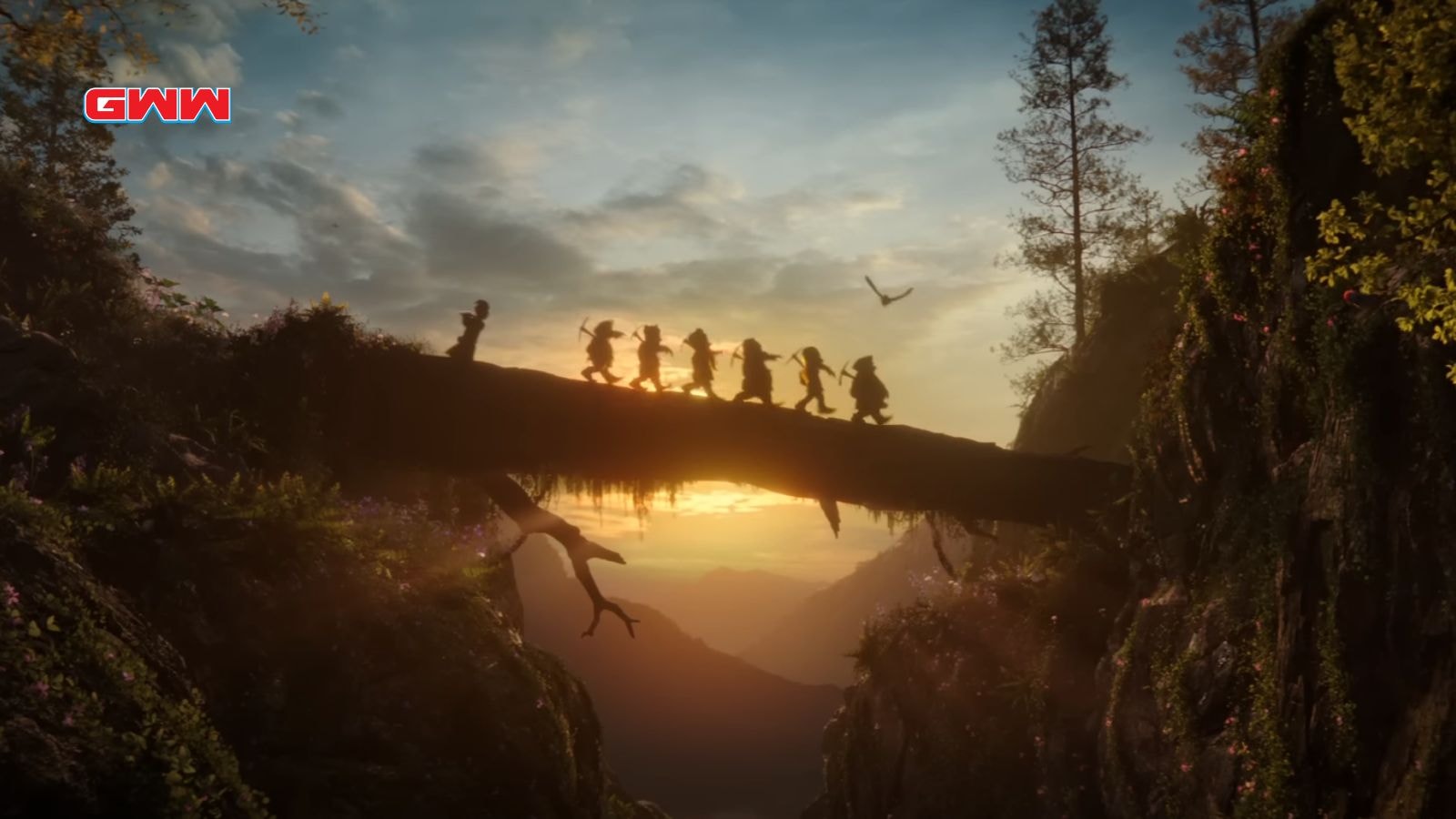 Silhouette of the seven dwarfs crossing a bridge during sunset in the forest.