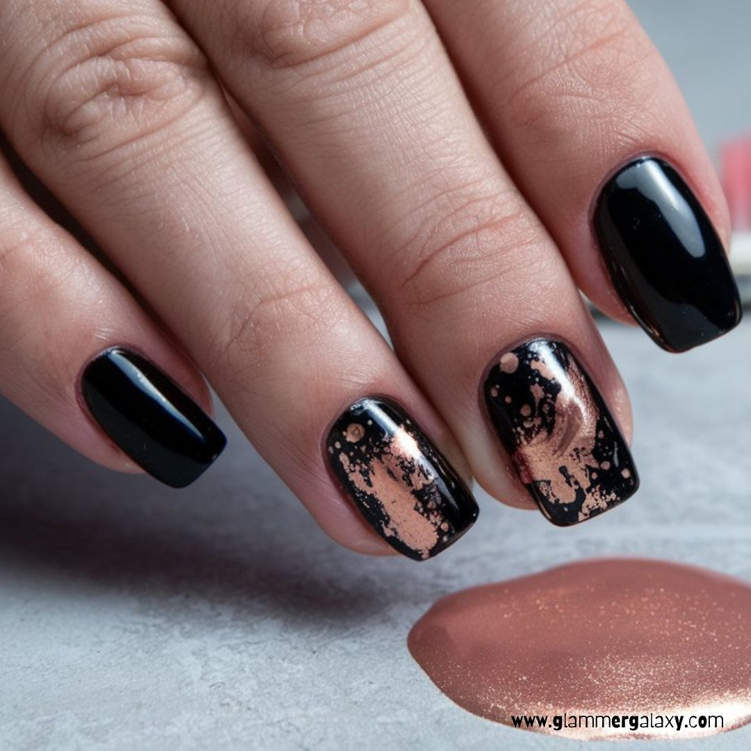 Black and Rose Gold Nail Designs having Glossy Black with Rose Gold Splatter Art
