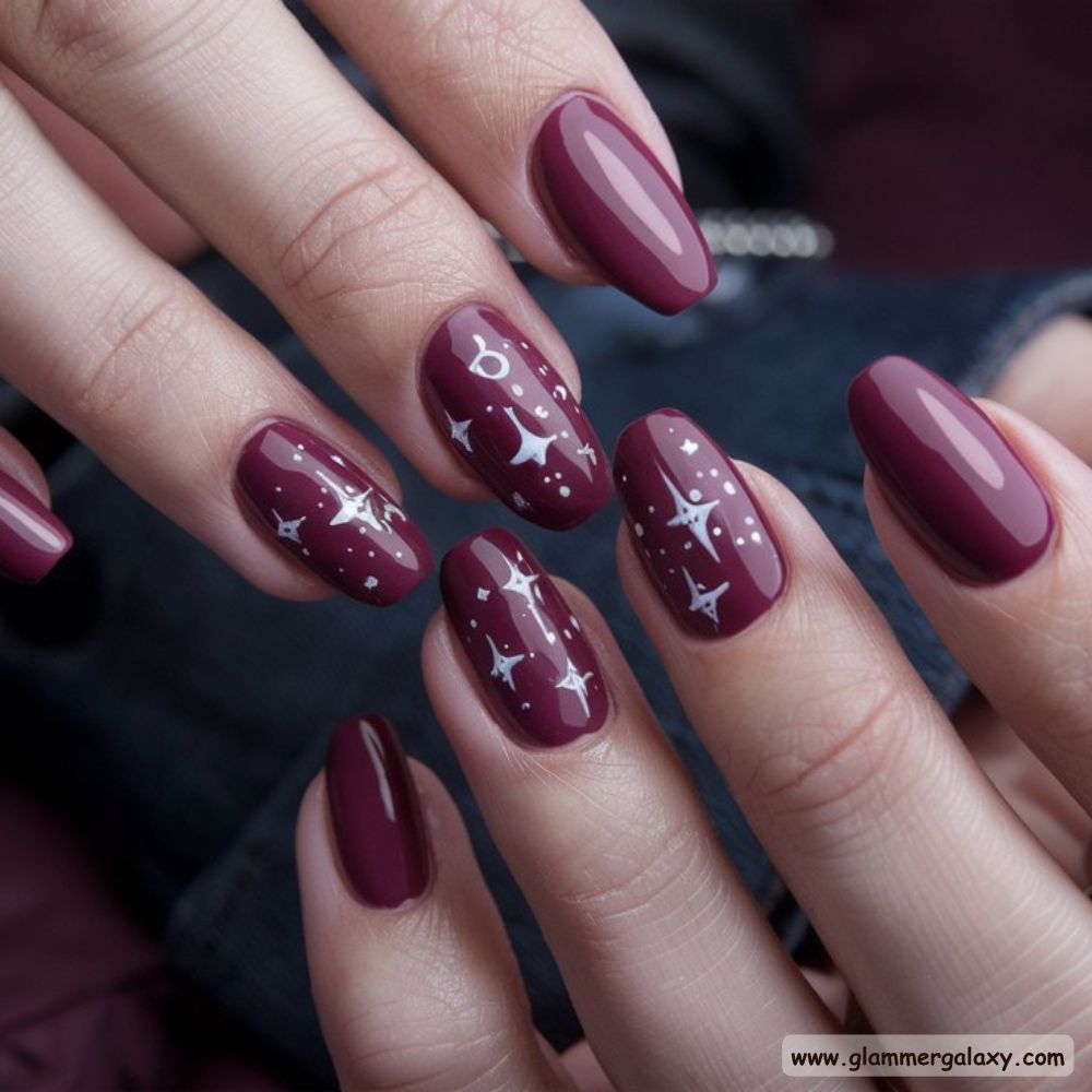 Burgundy fall Nails with Enchanting Celestial Theme