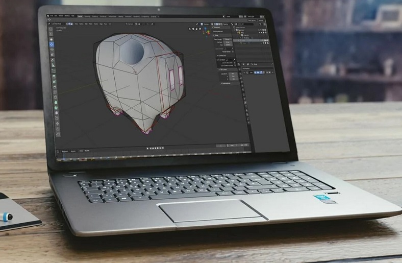 Laptop screen showing 3D modeling software