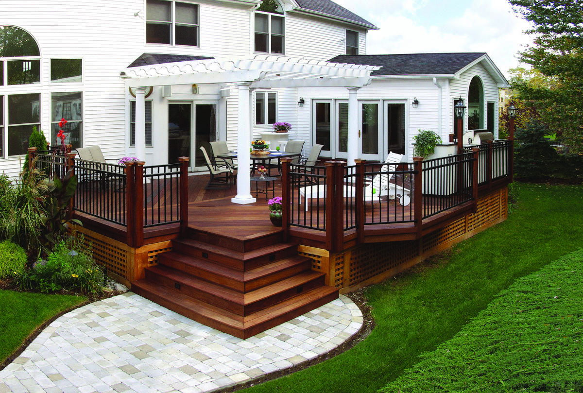 wood deck with white pergola on top