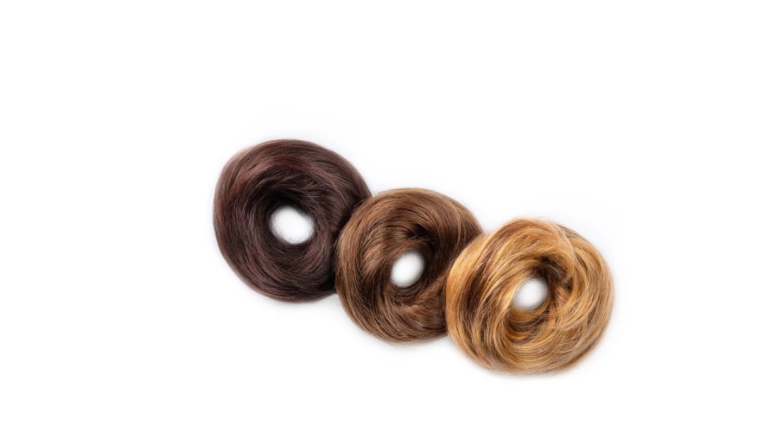 Top knot style using human hair scrunchie is trending
