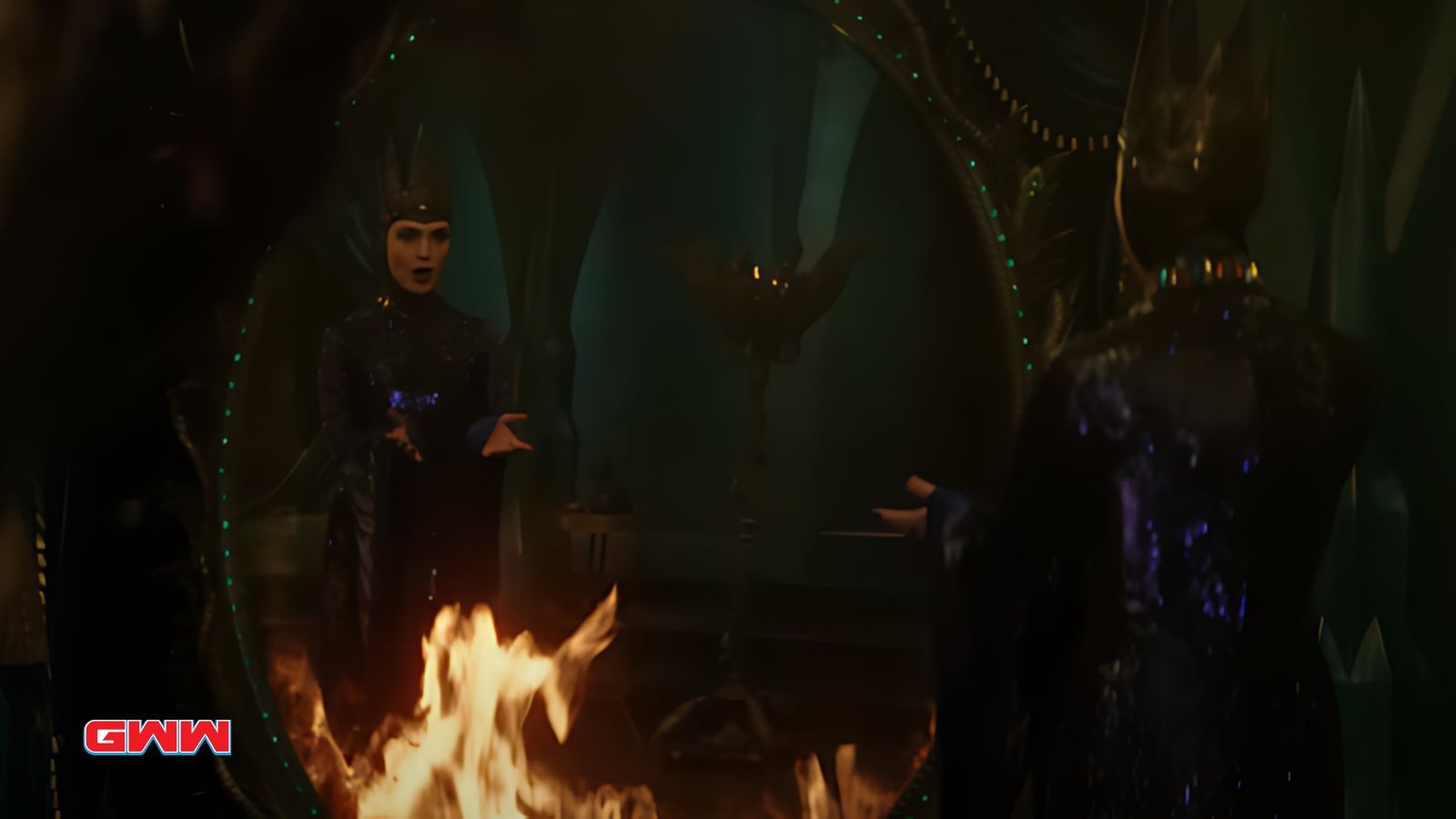 Gal Gadot as Queen Grimhilde the Evil Queen also called as Snow White Witch talking to the mirror in Snow White Live action