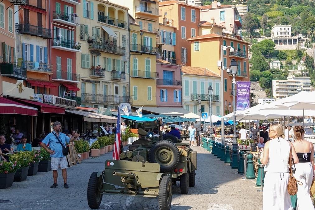 A military vehicle on a street

Description automatically generated