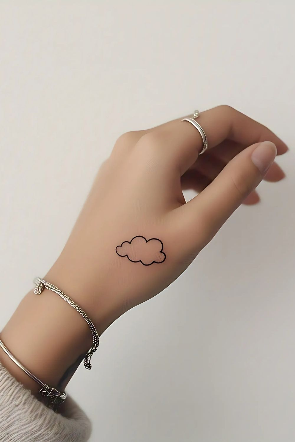 Cloud Tattoo on Hand