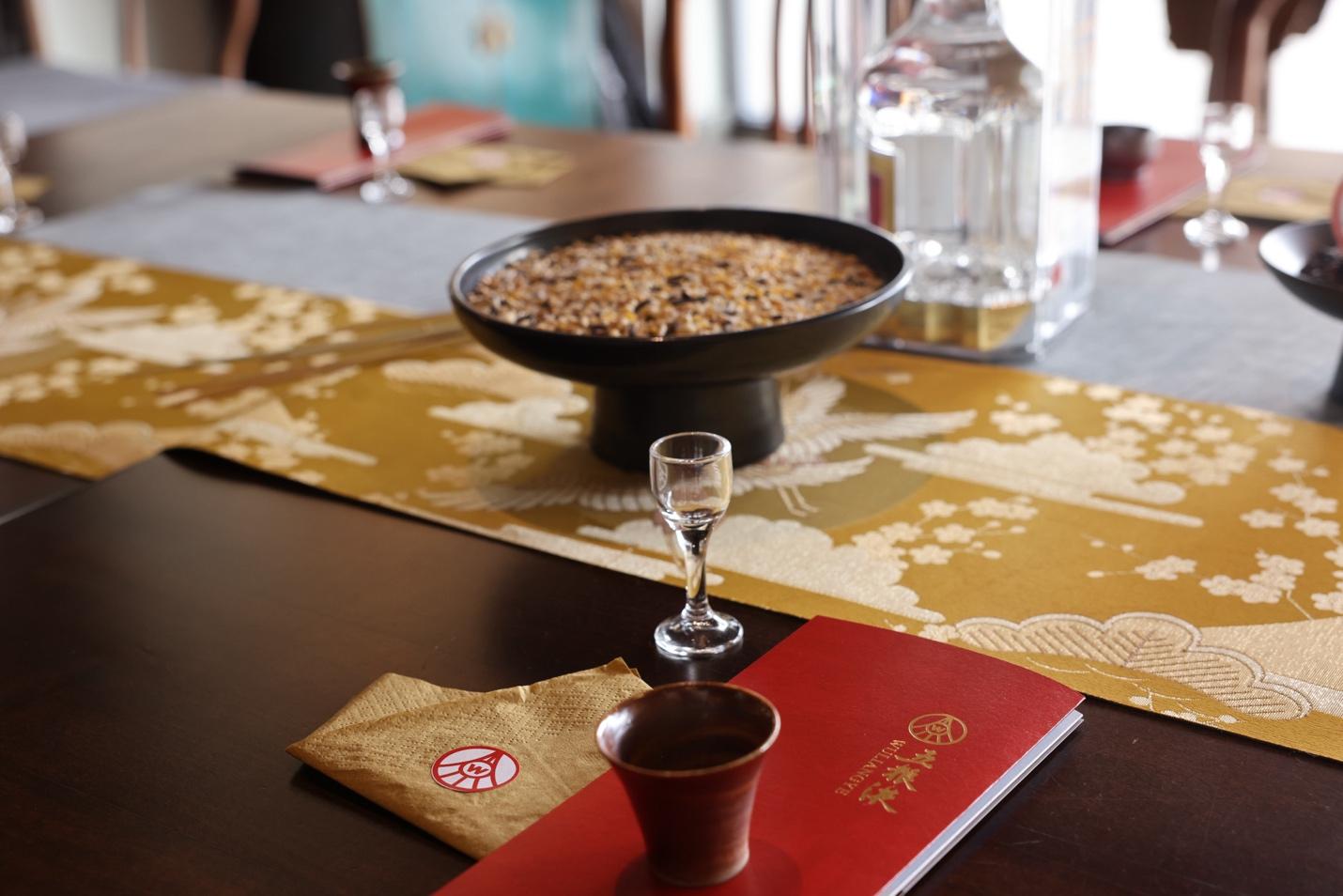 A bowl of food on a table

AI-generated content may be incorrect.