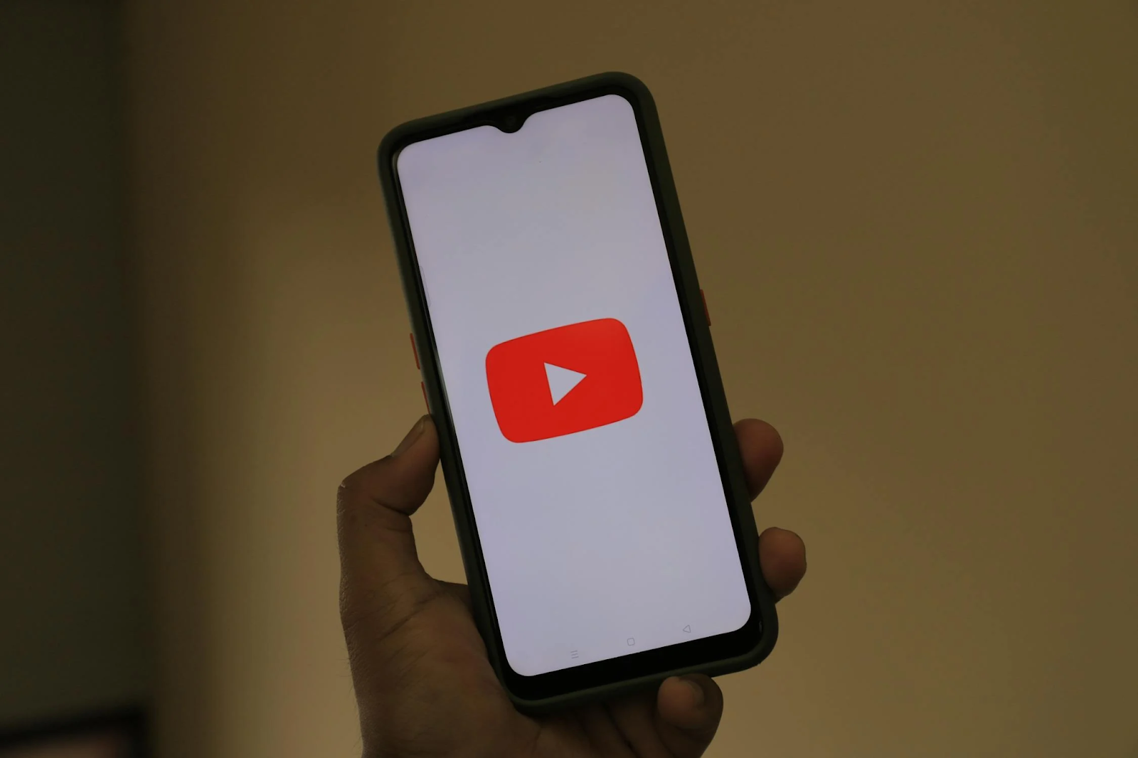 A phone with a YouTube icon