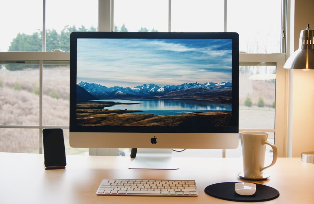 silver iMac ad wireless keyboard