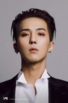 This contains an image of WINNER's Mino