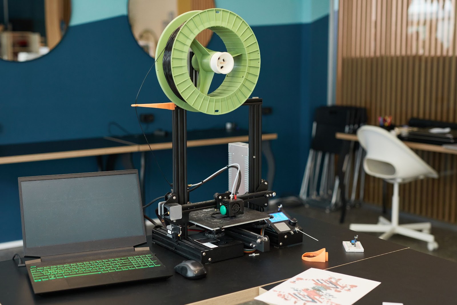  A 3D printer crafting a final product, illustrating rapid prototyping's impact on efficient product design.