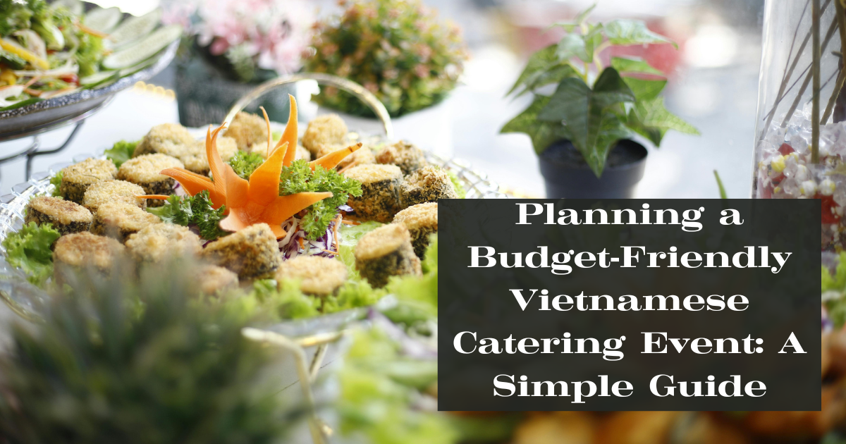 Budget-friendly Vietnamese catering spread with fresh herbs, fried appetisers, and decorative garnish on a buffet table.
