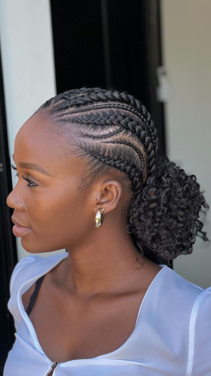 a lady rocking neat cornrow braids