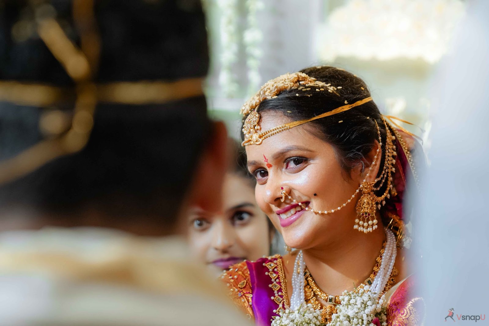 Bride peacefully gazing at the groom with a smile, capturing serene moments in 2025 wedding photography