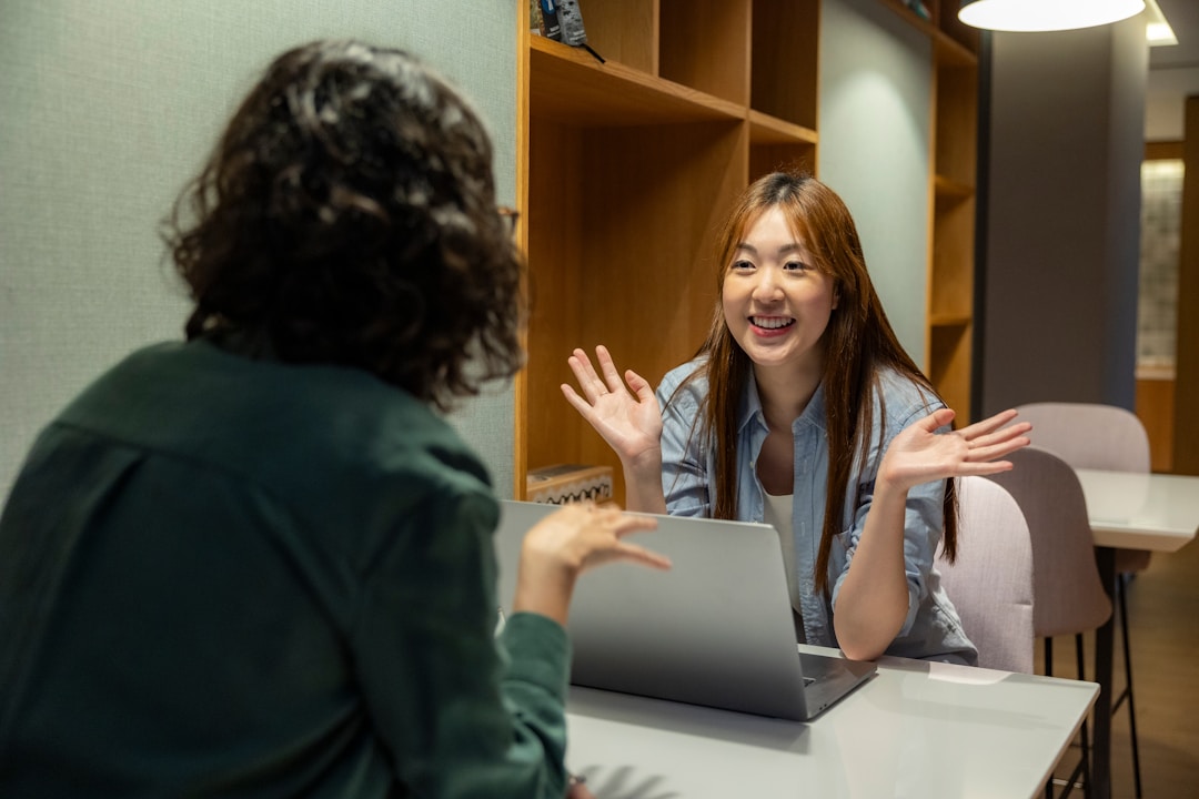 Professionals utilizing technology to enhance and streamline knowledge sharing