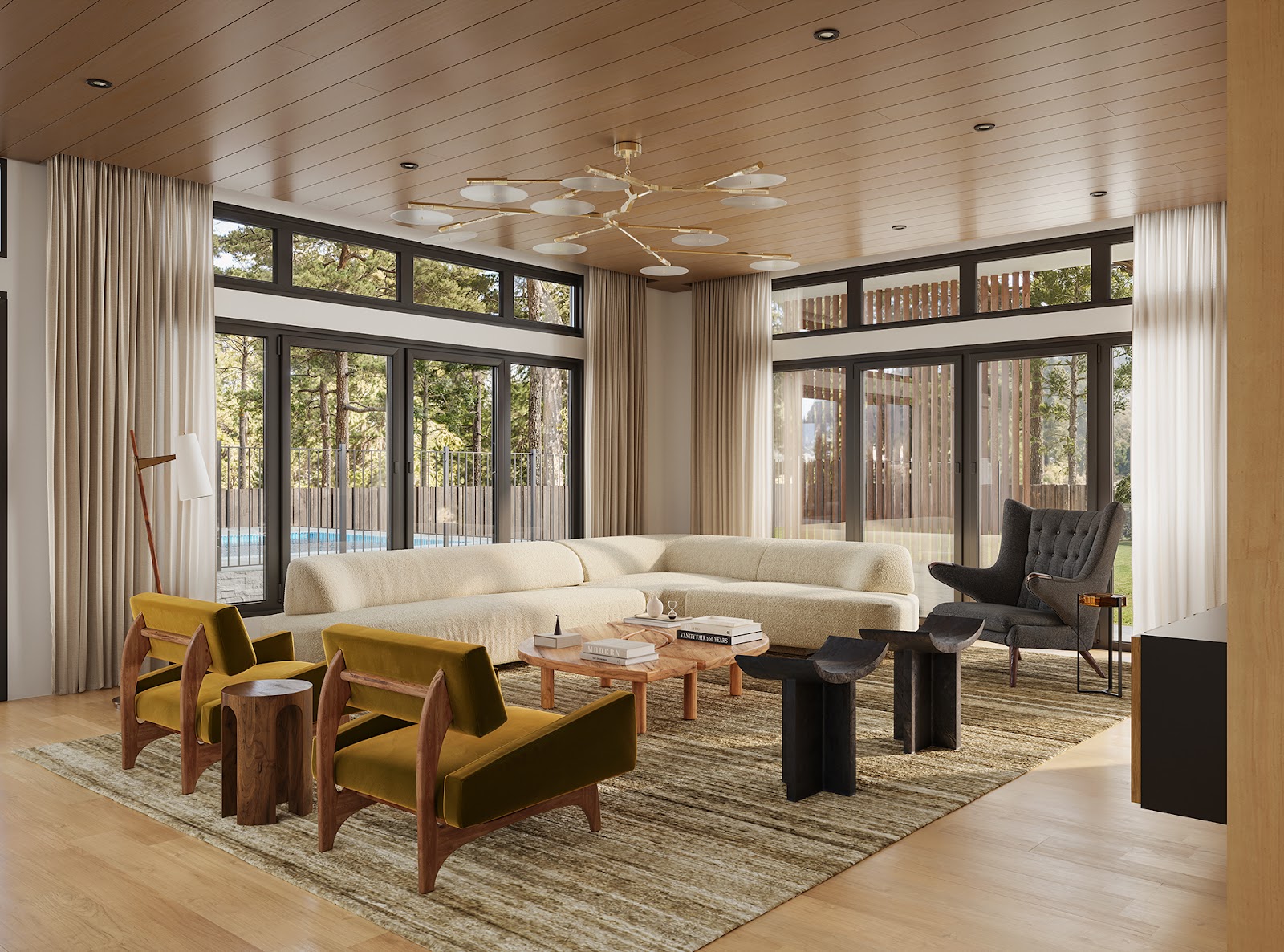 Warm and inviting chic living room design with statement lighting fixture and cozy cream sofa.