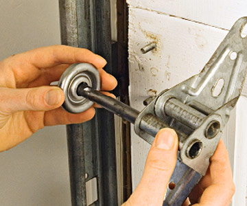 how to change garage door rollers