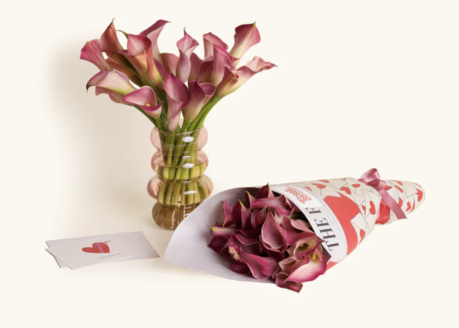 Valentine's Day tulips delivered from Fresh Sends arranged in a vase with water along with a personal note.&nbsp;