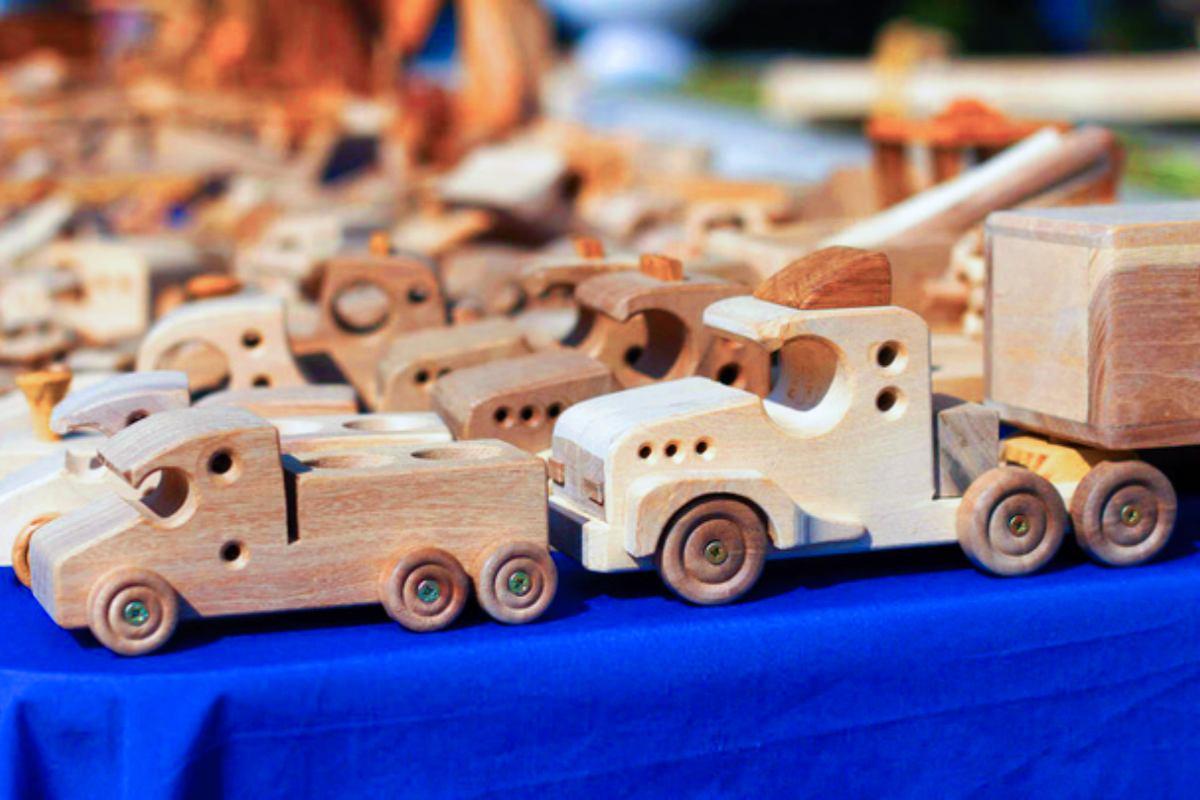 stock-photo-wood-carving-exhibition-professionally-carved-cars-trucks-children-toys