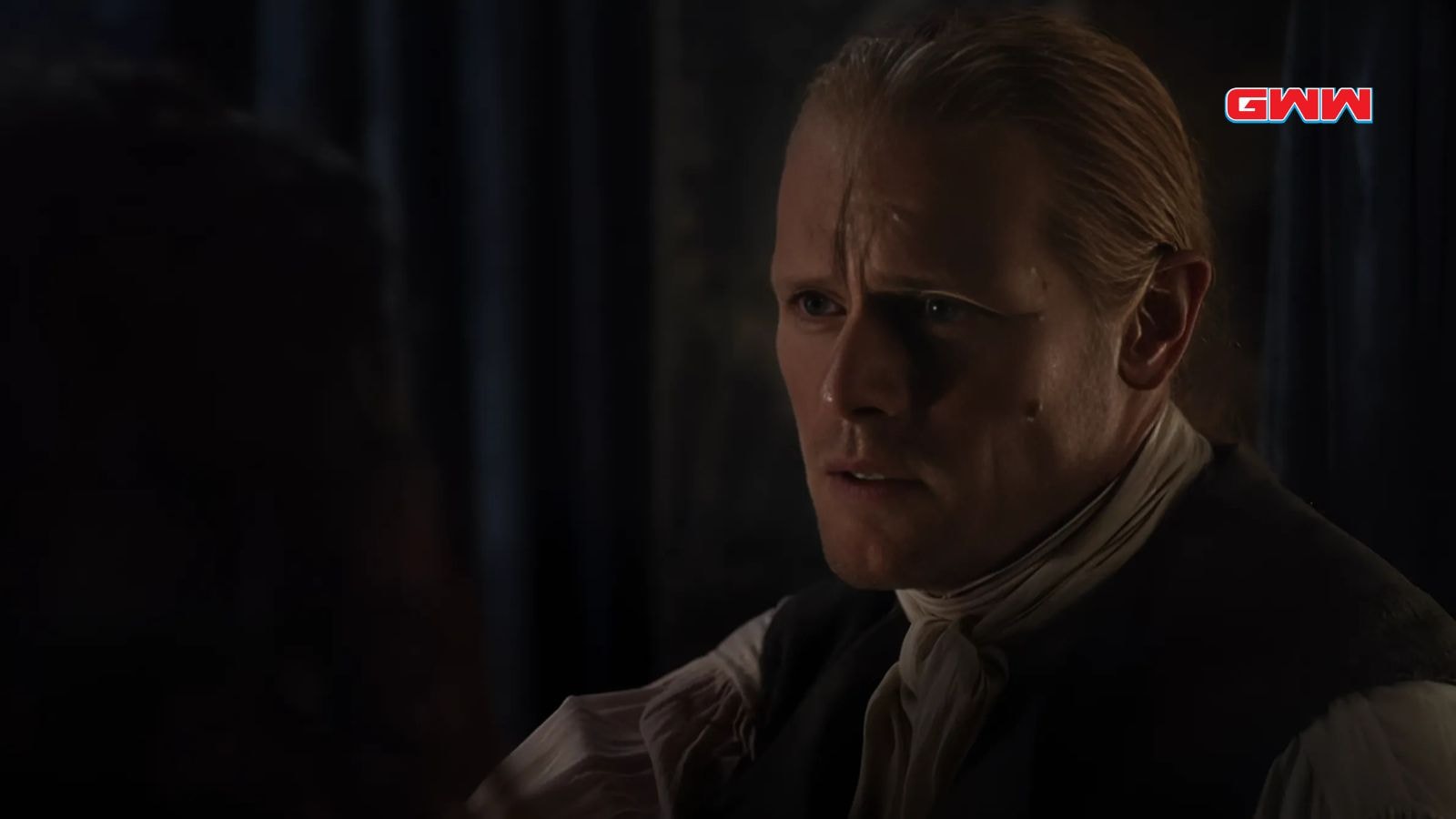 Sam Heughan as Jamie Fraser in a tense scene from Outlander Season 7