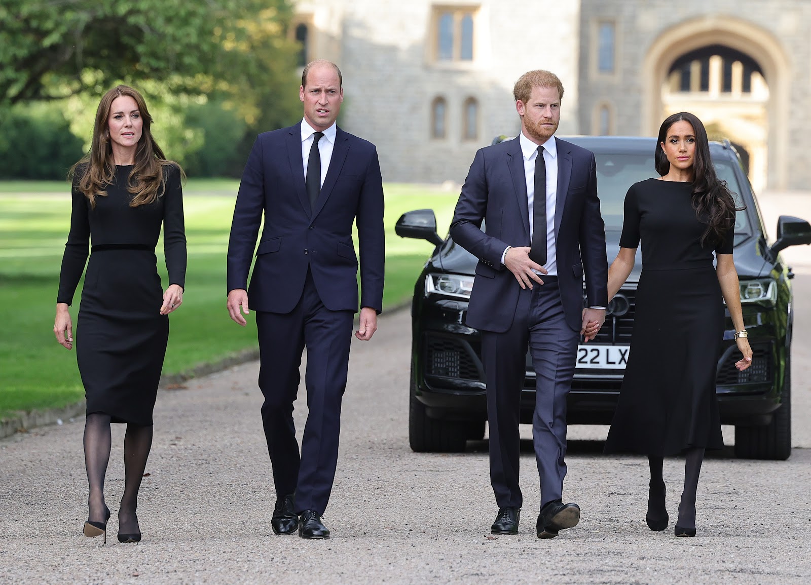 Princess Kate, Prince William, Prince Harry, and Meghan Markle photographed at Windsor Castle on September 10, 2022, in Windsor, England. | Source: Getty Images