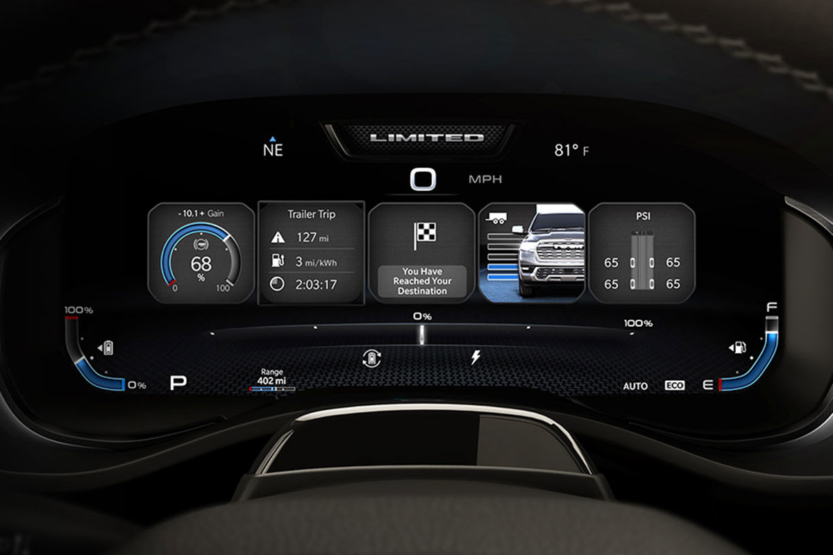 A view of the Driver Informational Digital Cluster Display inside of a 2025 Ram 1500 Ramcharger REx.