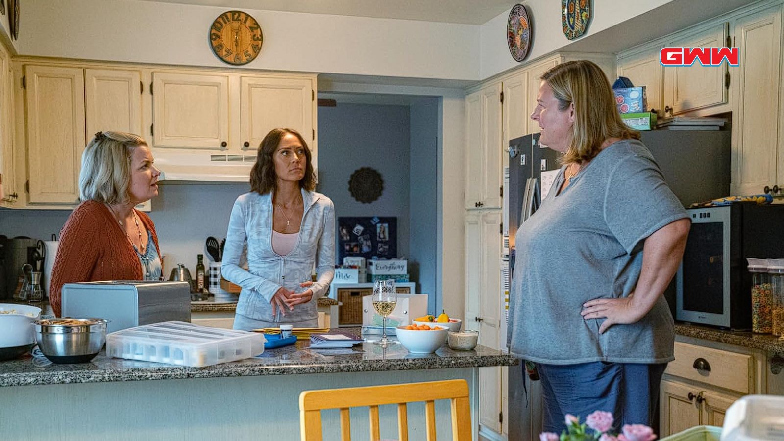 Bridget Everett, Mary Catherine Garrison, and Jennifer Mudge in a kitchen scene