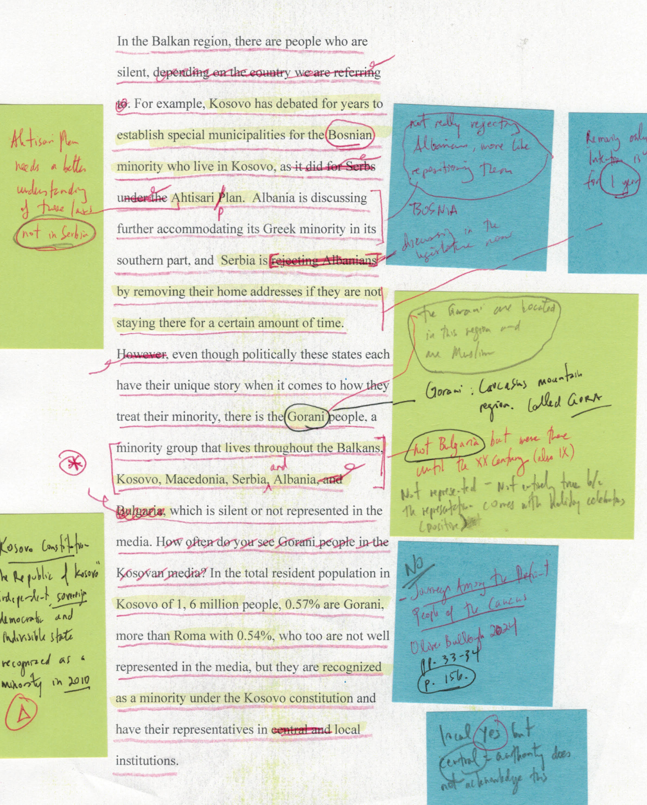 A printed word-processed document about Kosovo, with many handwritten sticky notes in the margin and text circles, highlighted, crossed out, etc.