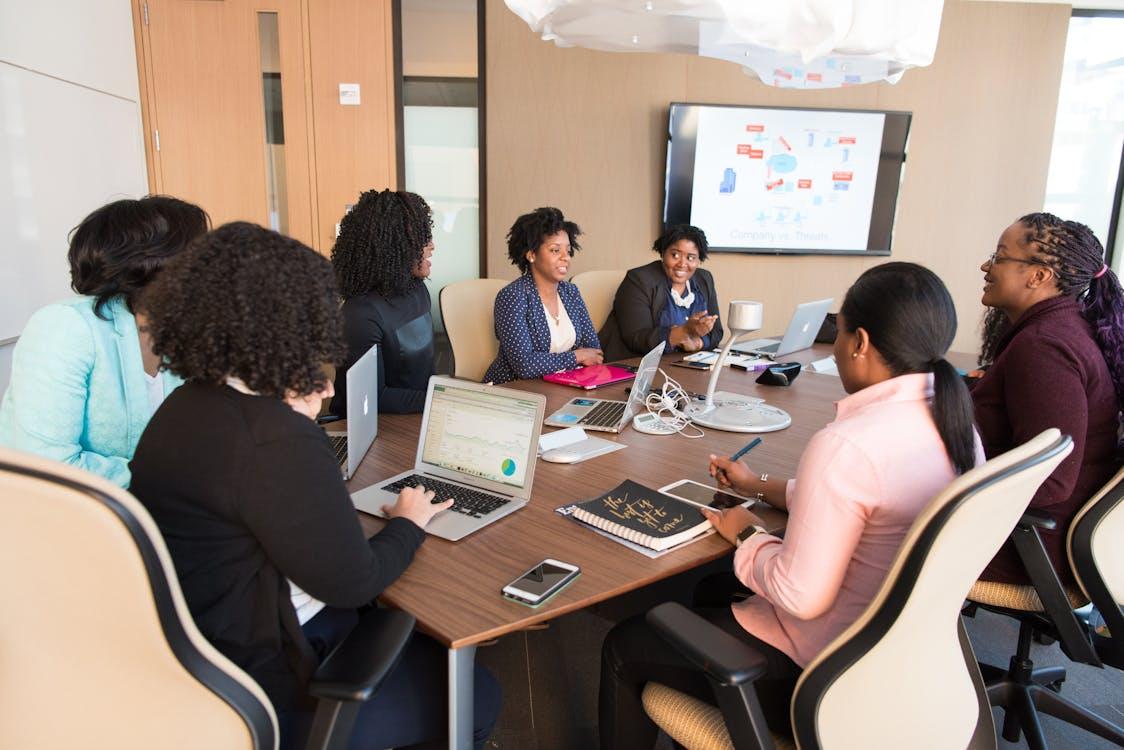 Free Employees having a Board Meeting  Stock Photo